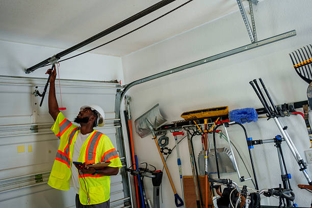 Professional Garage Door Panel Replacement technician working in Russell County County, KS